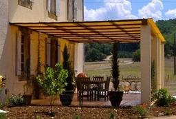 Traditional  pergola with steel frame on stone pillars and upvc "Bamboo" roof.