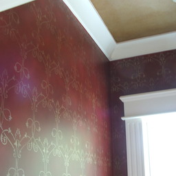 Walls stencilled in gold and antiqued