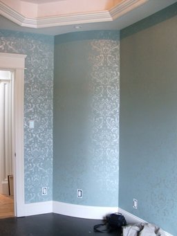 Walls stencilled with pearl paint