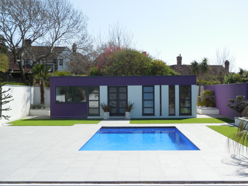 Concrete mosaic swimming pool with LED lighting and Certikin CoverStar Safety cover