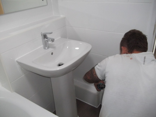 Robert of R K Sealants in Bathroom of Grand Hotel