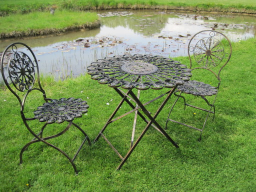 Heavy Gauge Fleur de Lys Table and two chairs