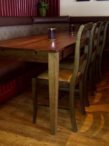 Brannigans, Blantyre. Solid oak dining table and Mara solid ash dining chairtable