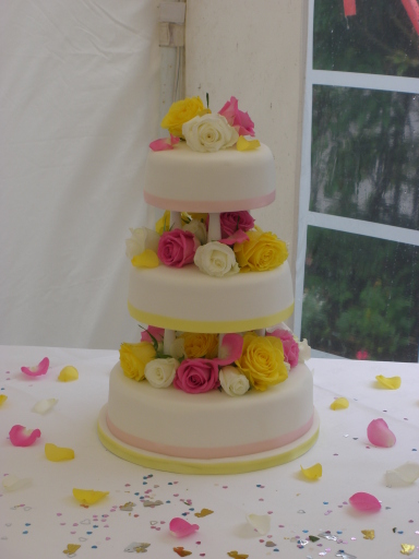 Pillared Wedding Cake with Fresh Roses