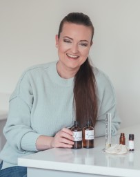 Lib's Aromatherapy owner with products