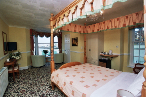 romantic four poster sea view