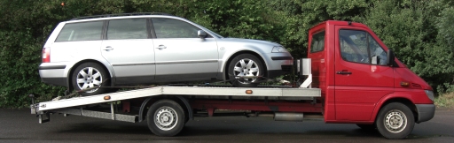 OxVehicle transportation and car removal.