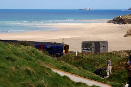 Visit Porth Kidney beach minutes from our beautiful cottages and apartments