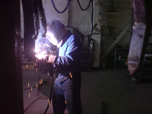 Repairs to steel tines on scrap grab.