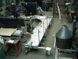 Stainless steel platform being assembled and mild steel hopper in workshop