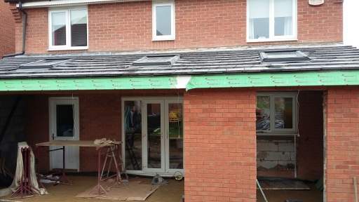 New roof for home extension with Velux Windows installed