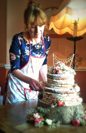 Final Decoration of a 2 Tier naked Wedding Cake