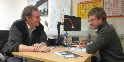 German Tutor and Student at Office