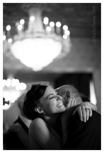 Photograph of kiss at Walton Hall wedding Warwickshire
