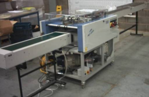 Lara Polywrapper with input &amp; output conveyors