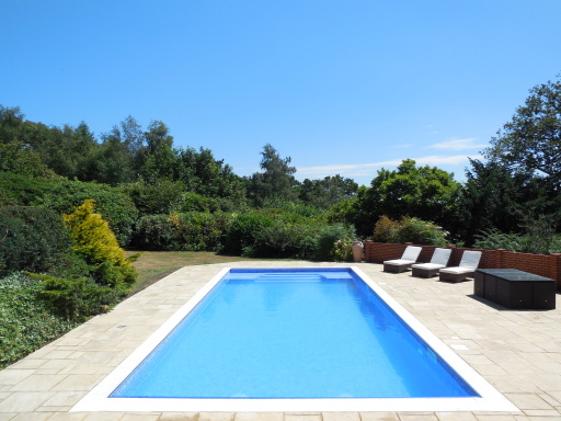 Concrete mosaic swimming pool with a Certikin CoverStar Safety cover