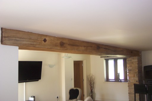 Steel RSJ disguised with hand made plaster beams