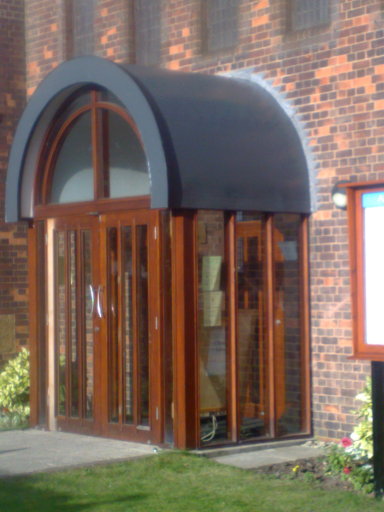 CHURCH ENTRANCE AFTER A LEAD THEFT