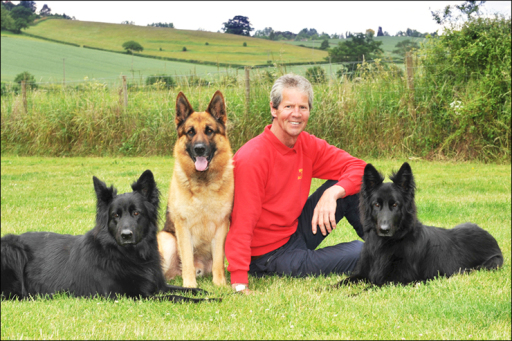 Mike at home with his dogs