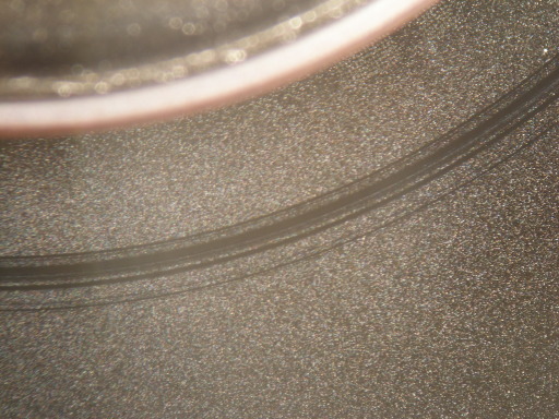 Platter damage from Seagate drive supplied by Apple. Firmware 7.01