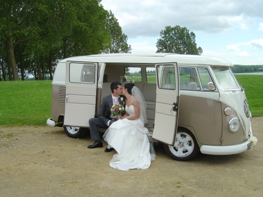 Enjoying photographs with VW split screen campervan Silk and Satin Weddings Northampton