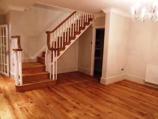 Professional dust free, floor sanded and restored oak floor boards and stairs, finished in osmo hard