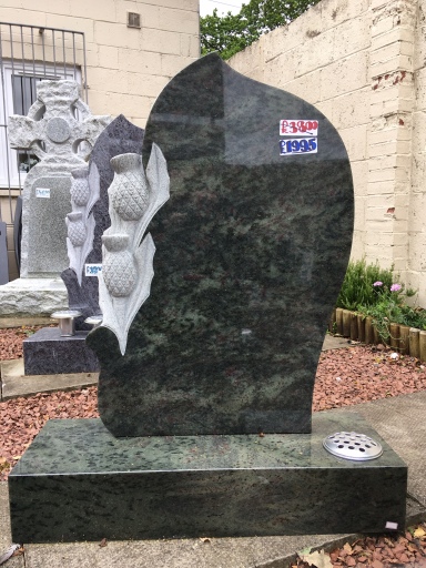 A small selection of headstones on display, prices are fully inclusive