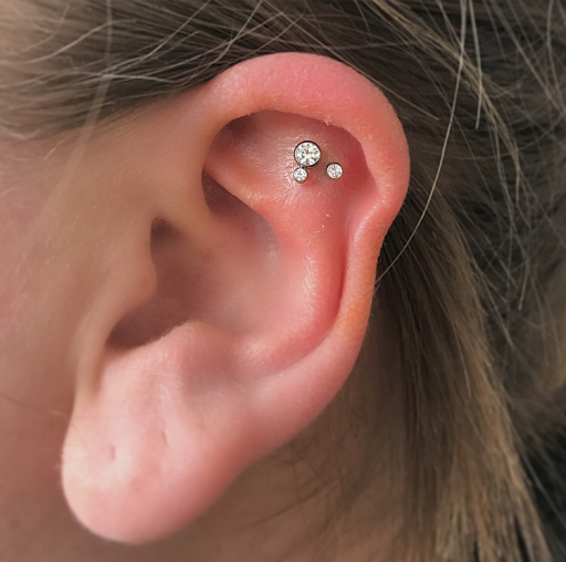 Double flat piercing by Mara