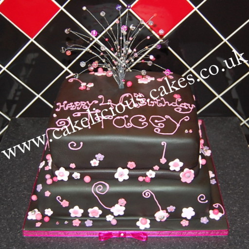 2 Tier Black and pink cake with beaded topper