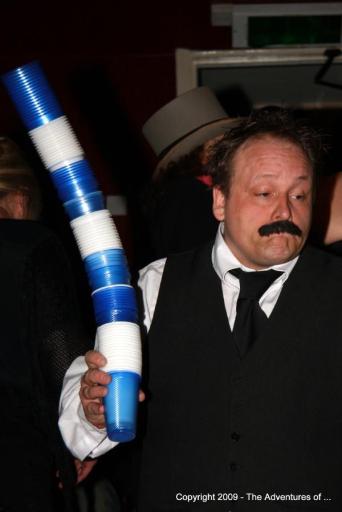 Claude comedy waiter and his stack of cups