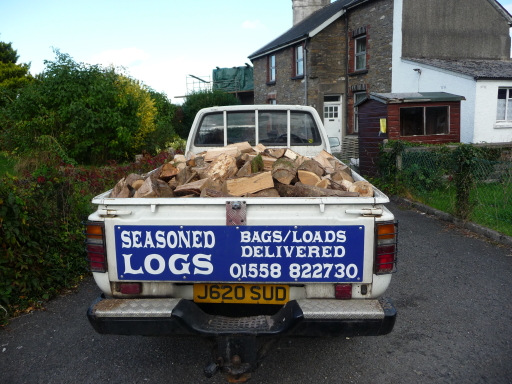 a load of logs ready for delivery ??100