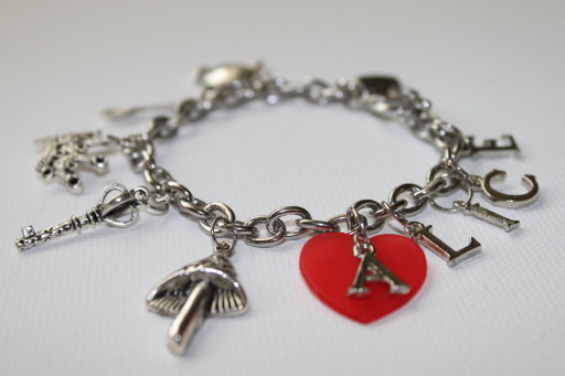 alice in wonderland themed vintage charm bracelelt