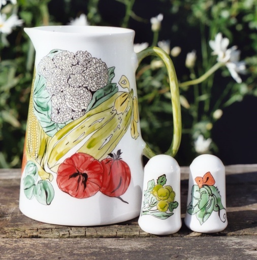 Vegetable design hand painted jug and cruet set.