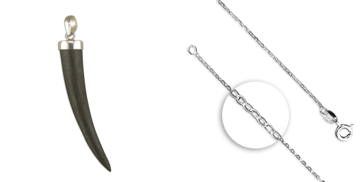 An ebony Shark tooth style pendant on an 18 inch silver chain