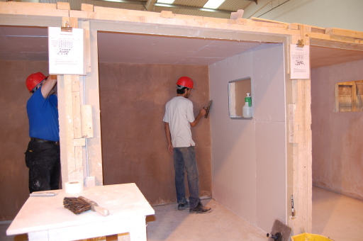 Hard at work plastering