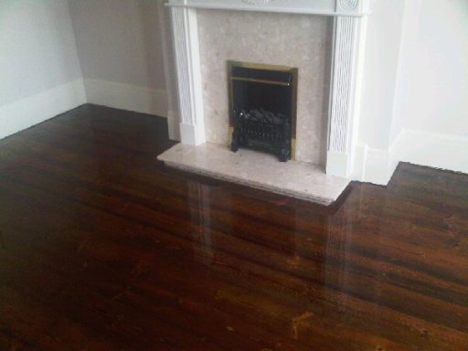 Original Pine flooring sanded and stained with Dark Oak Stain.