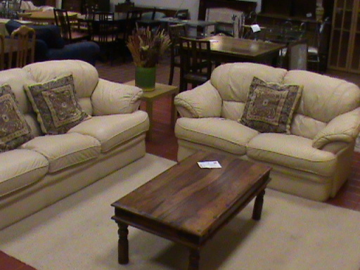 cream sofa and wood coffee table at EFI superstore