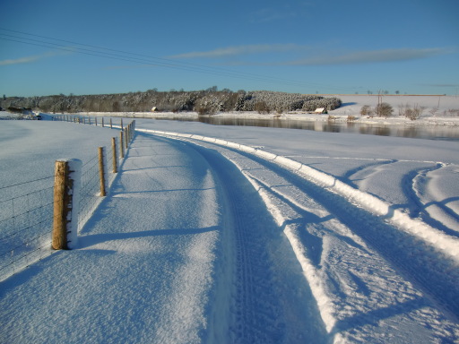 Snowy scene on River Tweed at West Ord Cottages, Berwick upon Tweed
