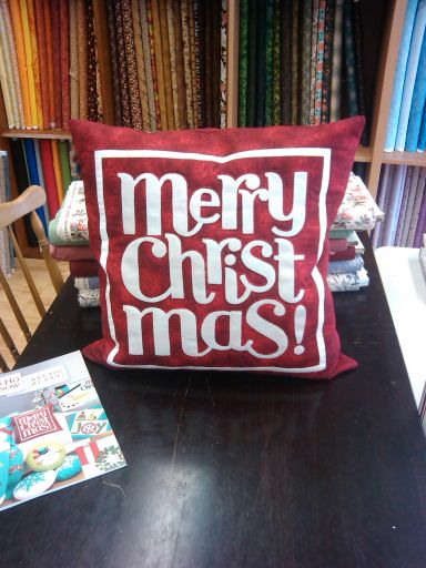 Merry Christmas cushion pattern can be found in our Ho Ho Ho Let It Snow pattern book