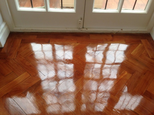 Parquet floor after applying a hard wax oil.