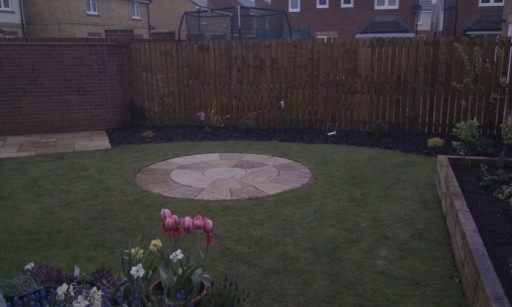 New patios, raised beds and planting scheme