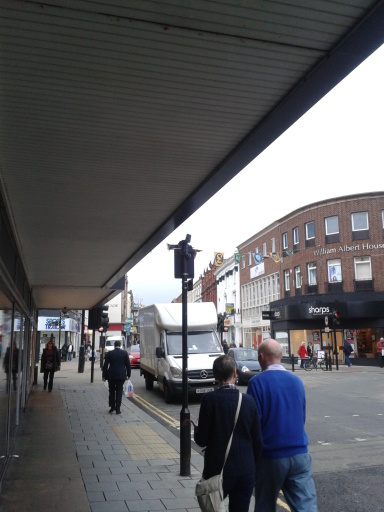 Typical discreet camera mounted on the top of a sign post, for surveys of traffic, pedestrians, etc.