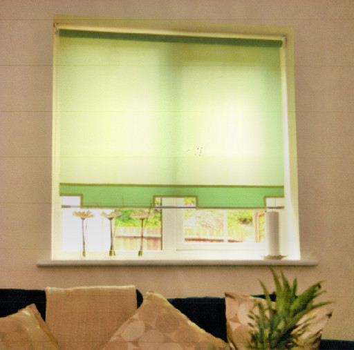 Roller blind with bar
