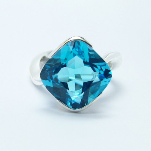 Electric blue topaz silver cocktail ring.
