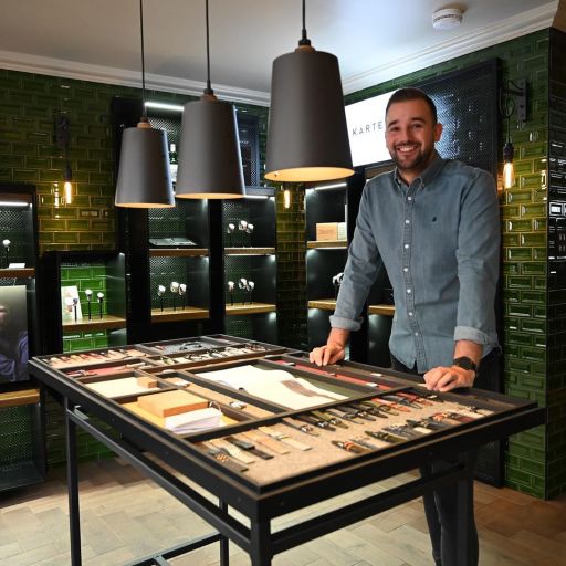 Shop manager Dale at the watch building table