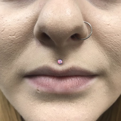 Philtrum piercing by Mara