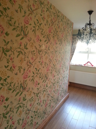 An upstairs landing wallpapered