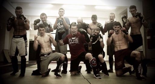 Striking and grappling at the end of a great night photo.