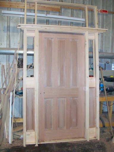 Solid wood door with side lights