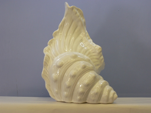 Shell toilet brush holder